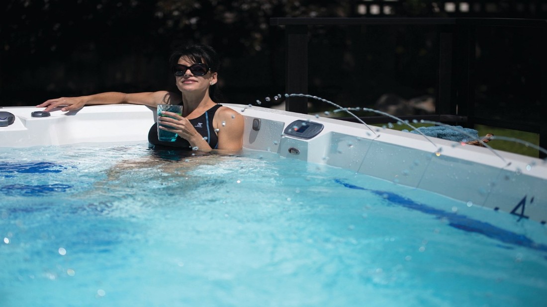 Woman relaxing on a hot tub