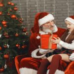 Little girl talking to Santa