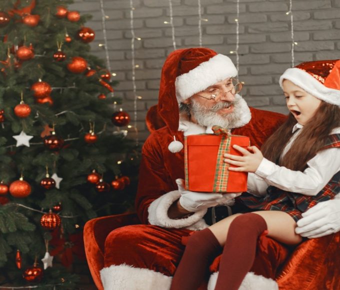 Little girl talking to Santa