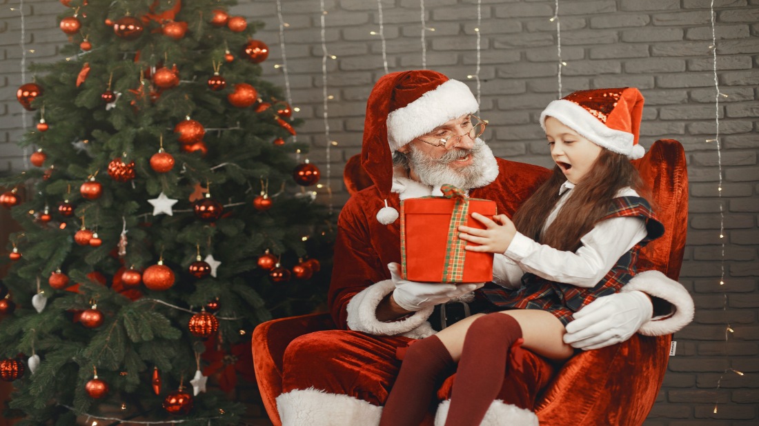 Little girl talking to Santa